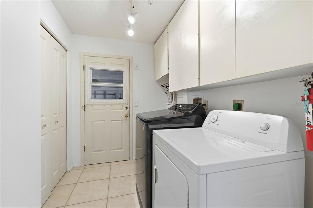 3927 Country View Lane Sarasota, FL 34233 - Photo 41 of 48 a utility room with dryer and washer