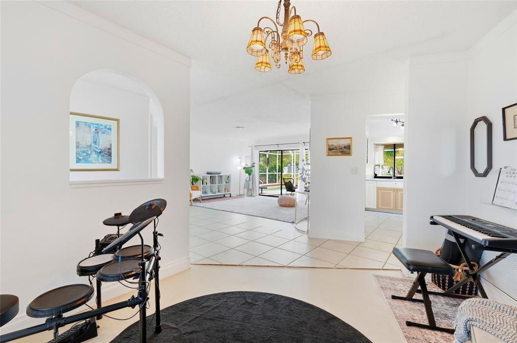 3927 Country View Lane Sarasota, FL 34233 - Photo 8 of 48 a view of a livingroom and a workspace