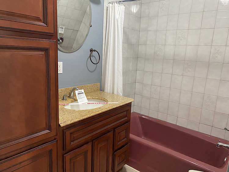 1628 North 2510th Road Ottawa, IL 61350 - Photo 12 of 24 a bathroom with a granite countertop sink a mirror and shower