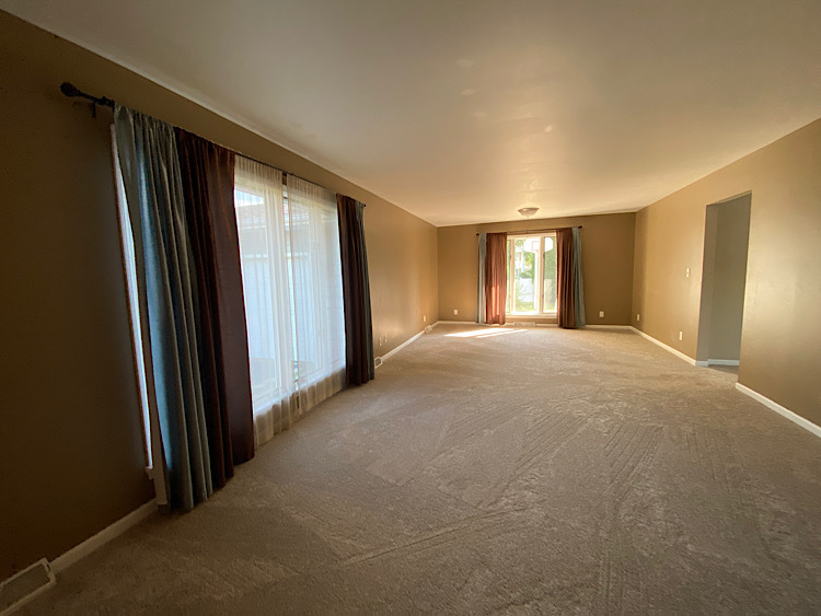 1628 North 2510th Road Ottawa, IL 61350 - Photo 4 of 24 a view of a big room with windows and chandelier fan