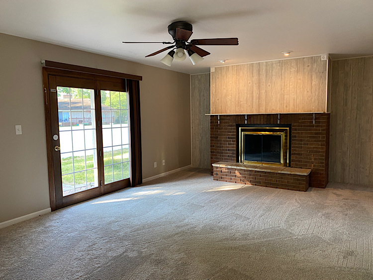 1628 North 2510th Road Ottawa, IL 61350 - Photo 5 of 24 a view of empty room with fireplace and fan