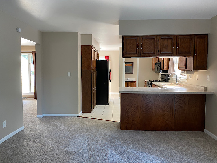 1628 North 2510th Road Ottawa, IL 61350 - Photo 6 of 24 a kitchen with stainless steel appliances a refrigerator a stove a sink and a cabinets
