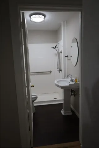 a view of an empty room with a window