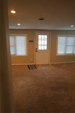 an empty room with windows