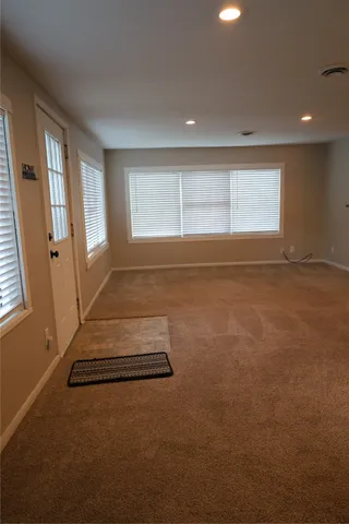 an empty room with windows