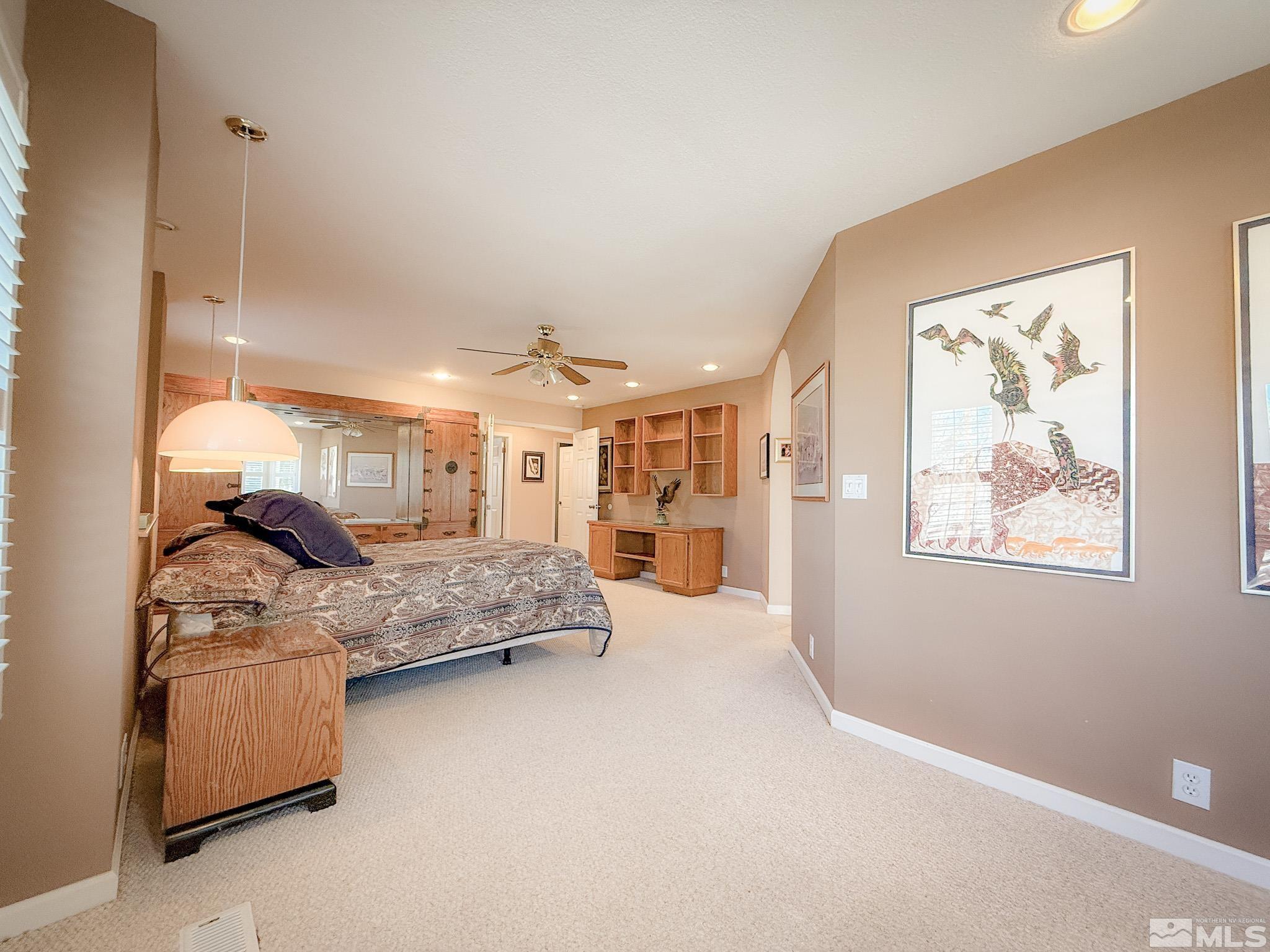 3775 Clover Way Reno, NV 89509 - Photo 14 of 40 a bedroom with furniture and a large window