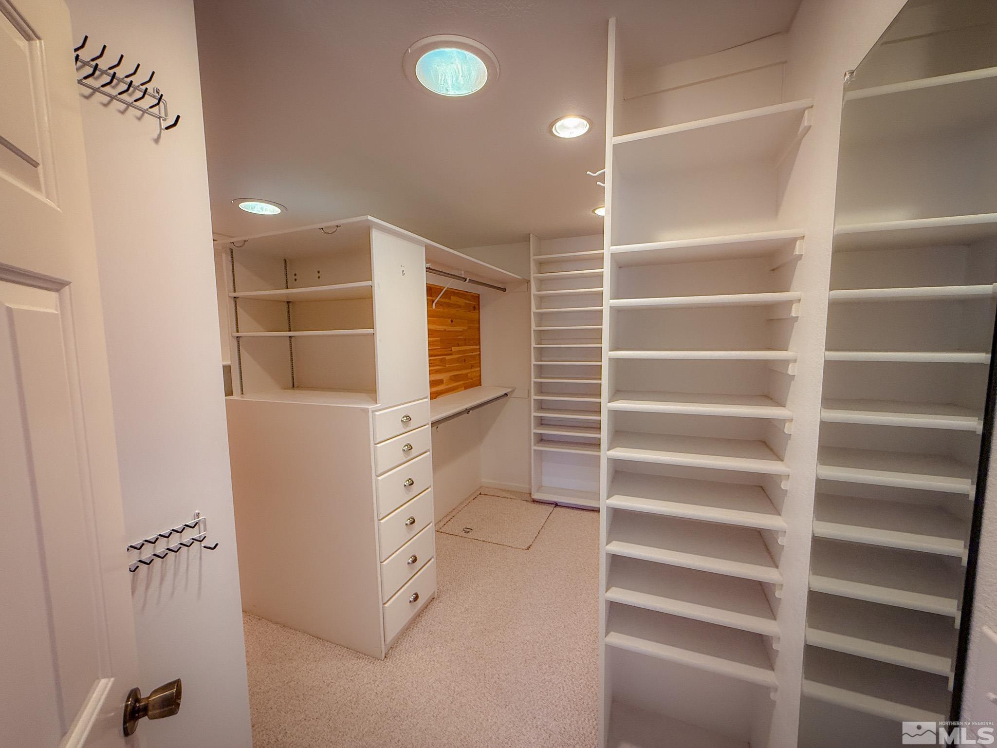 3775 Clover Way Reno, NV 89509 - Photo 16 of 40 a view of walk in closet with empty racks