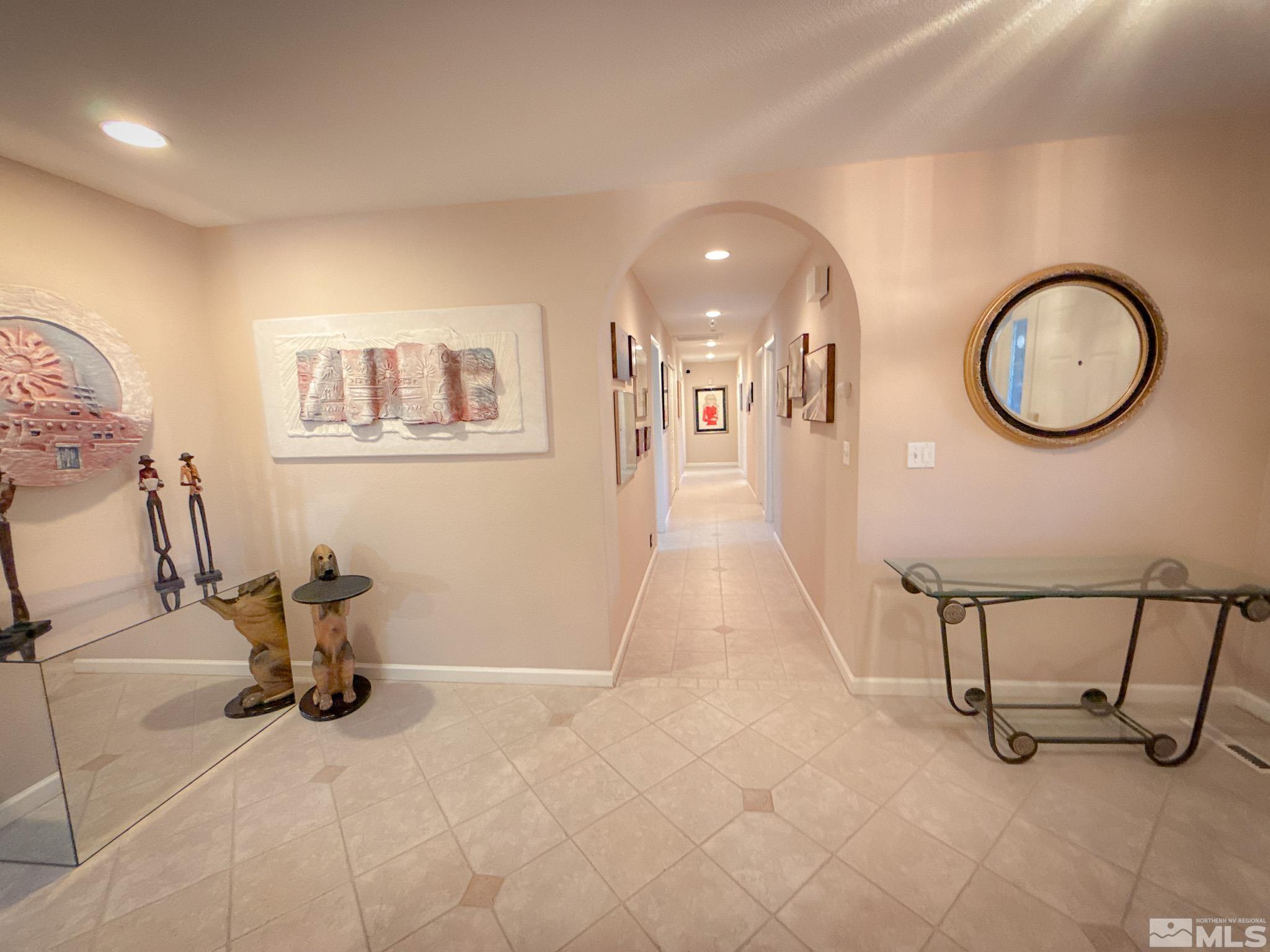 3775 Clover Way Reno, NV 89509 - Photo 3 of 40 a very nice looking room with a chair