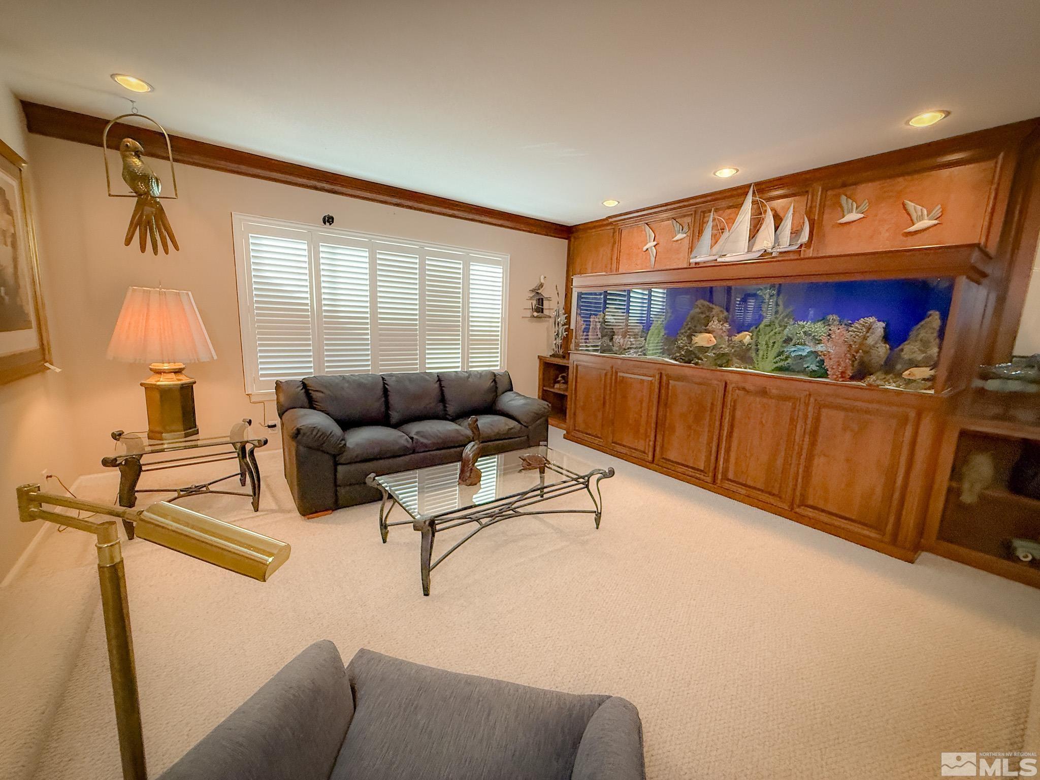 3775 Clover Way Reno, NV 89509 - Photo 6 of 40 a living room with furniture and a flat screen tv