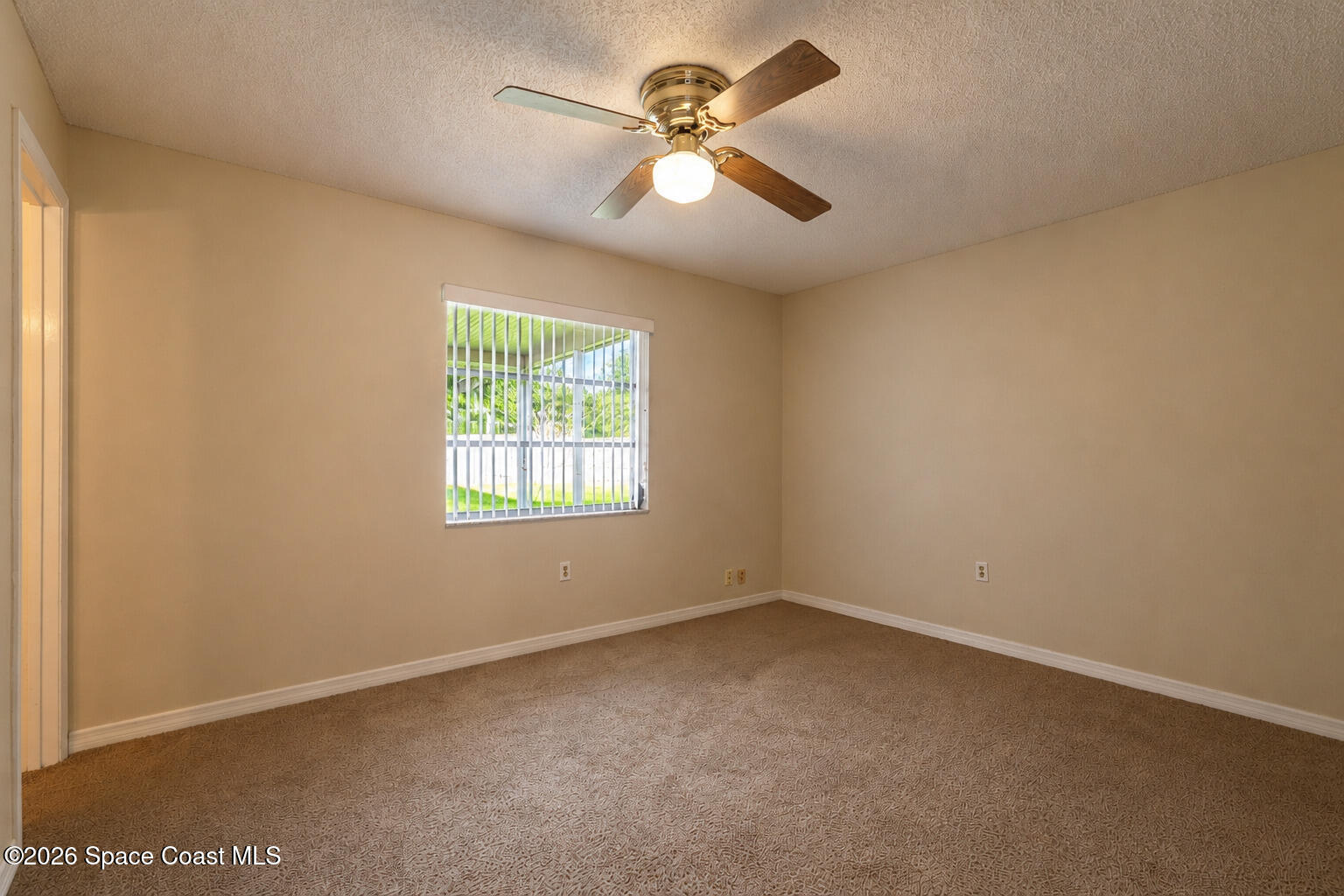 2882 Pembroke Road Melbourne, FL 32935 - Photo 12 of 26 13-Primary Bedroom