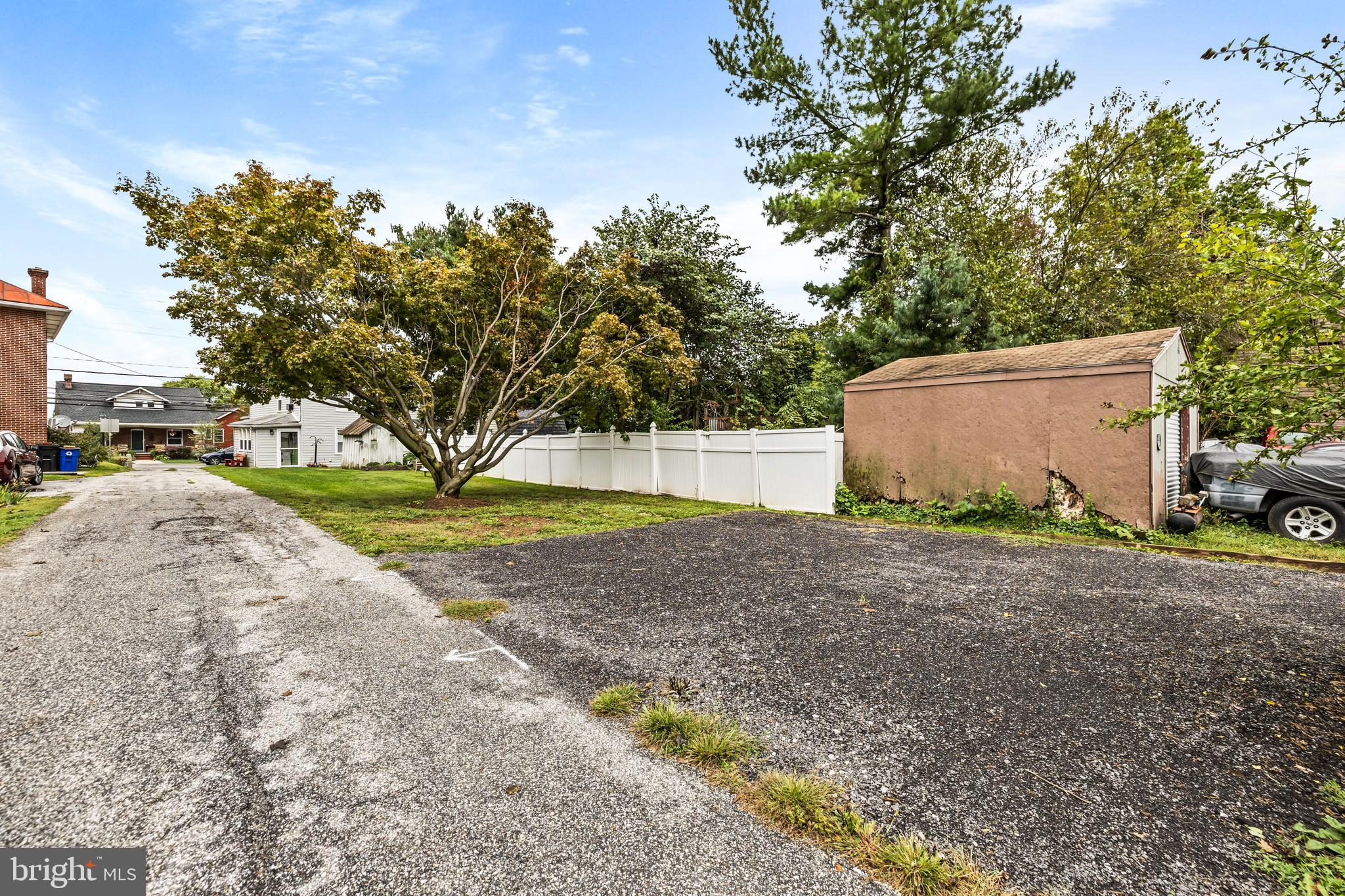1030 South Main Street Hampstead, MD 21074 - Photo 20 of 20 a backyard of a house with lots of green space