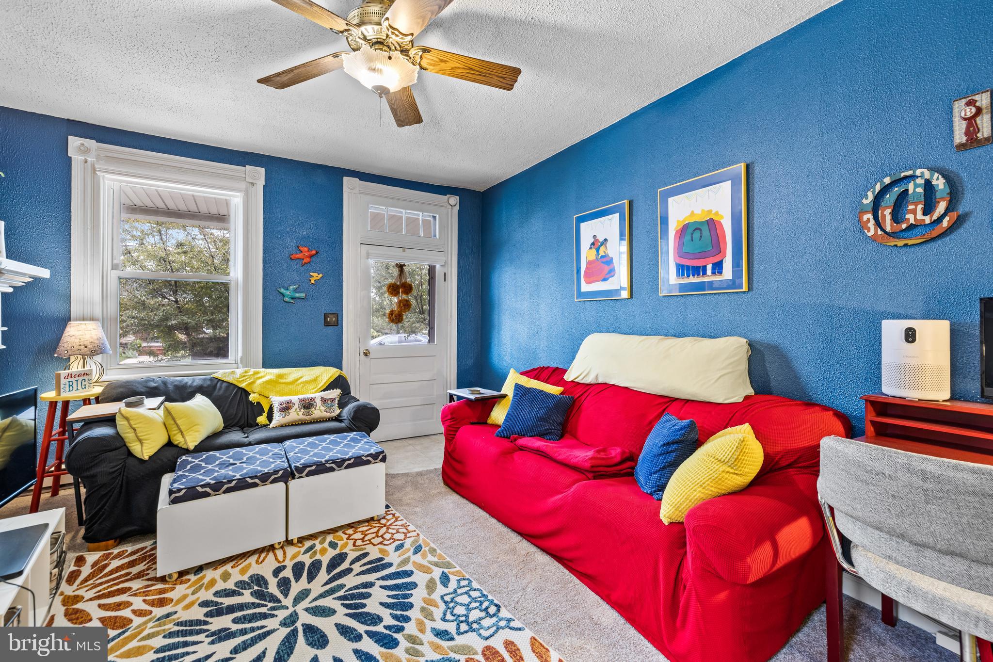 1030 South Main Street Hampstead, MD 21074 - Photo 5 of 20 a living room with furniture and a large window