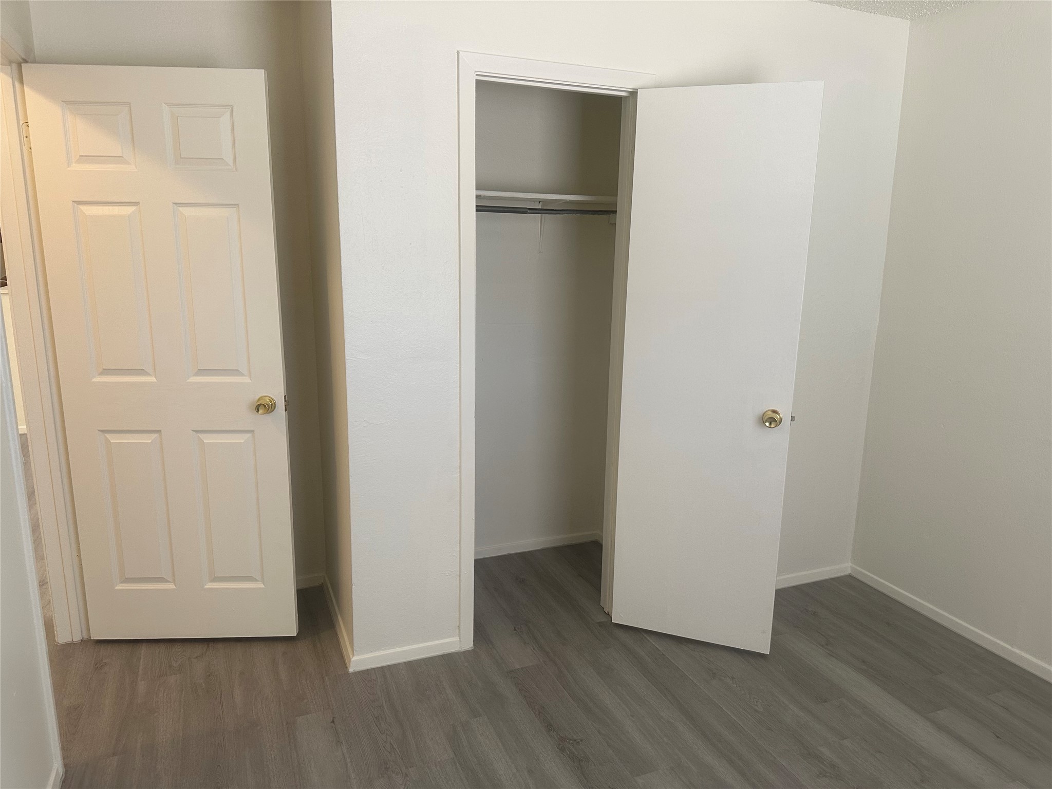 2602 South Bagdad Road, Unit B Leander, TX 78641 - Photo 18 of 23 Crisp white walls and clean laminate flooring define this versatile interior space.
