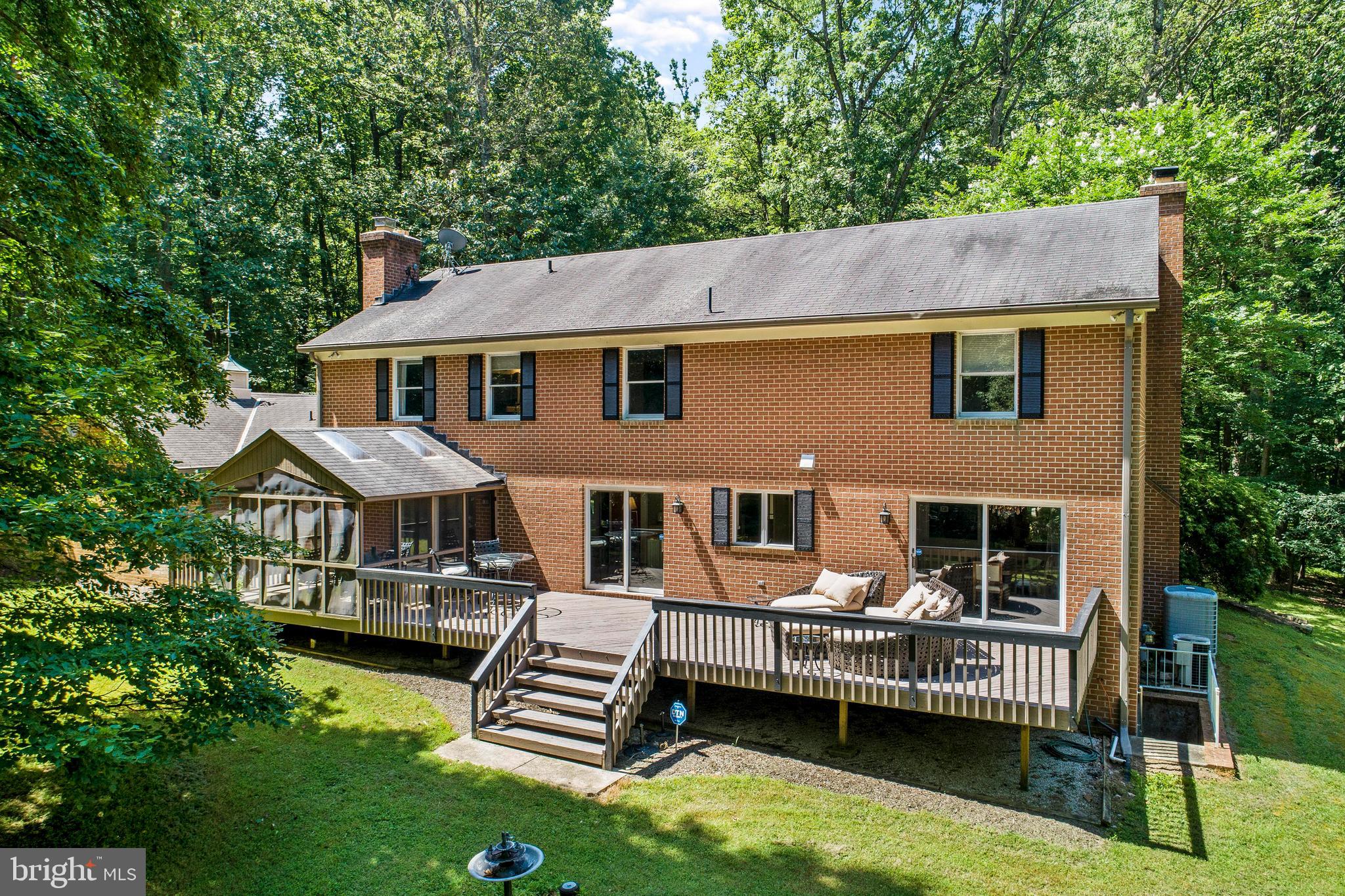 2106 Tufton Ridge Road Reisterstown, MD 21136 - Photo 37 of 41 Rear View of Deck and Screened-In Porch