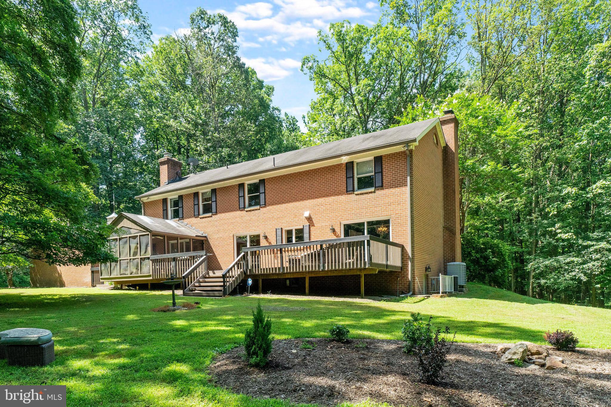 2106 Tufton Ridge Road Reisterstown, MD 21136 - Photo 38 of 41 Repainted Deck with Attached Screened-In Porch