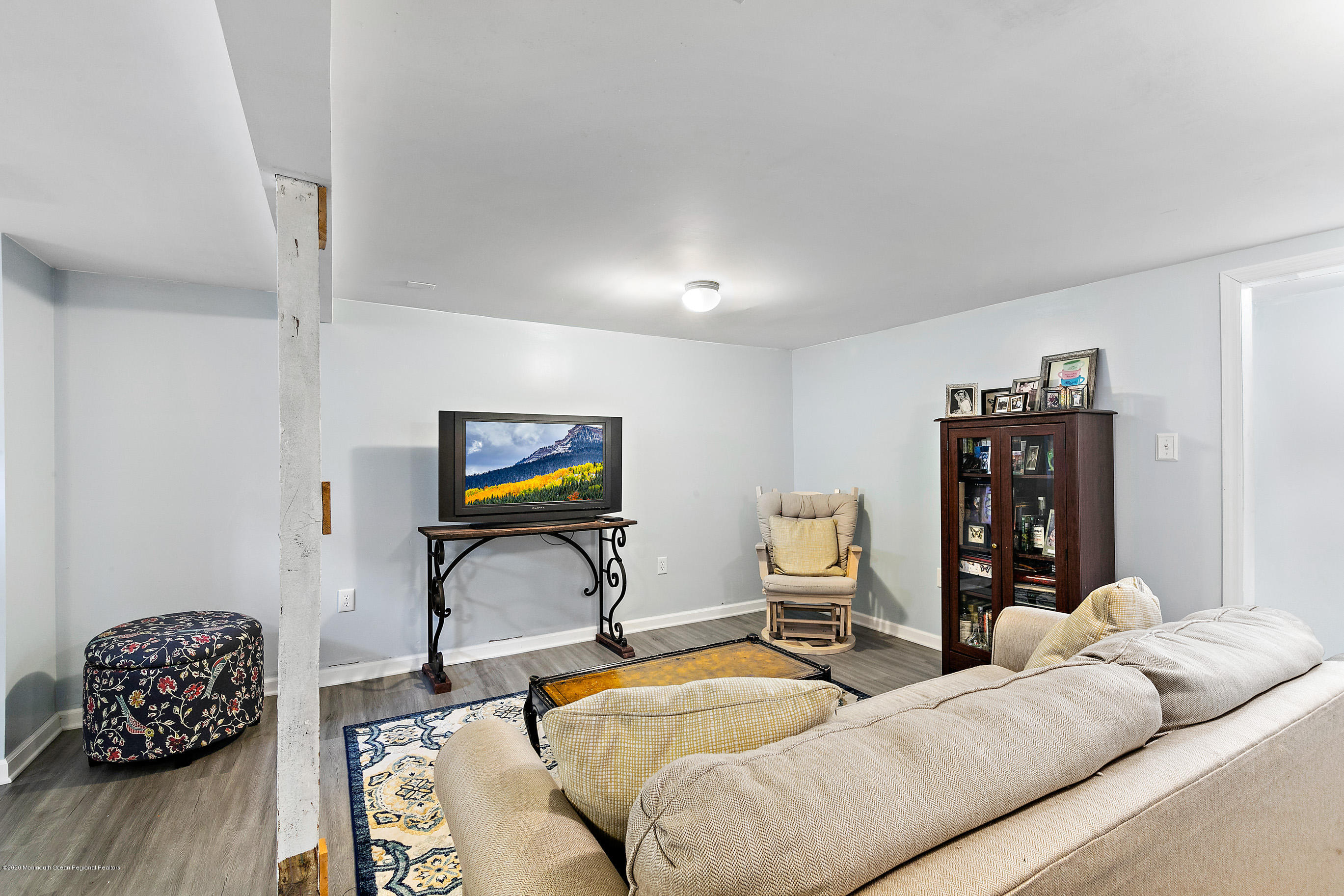 47 Dock Road Brick, NJ 08723 - Photo 27 of 44 a living room with furniture and wooden floor