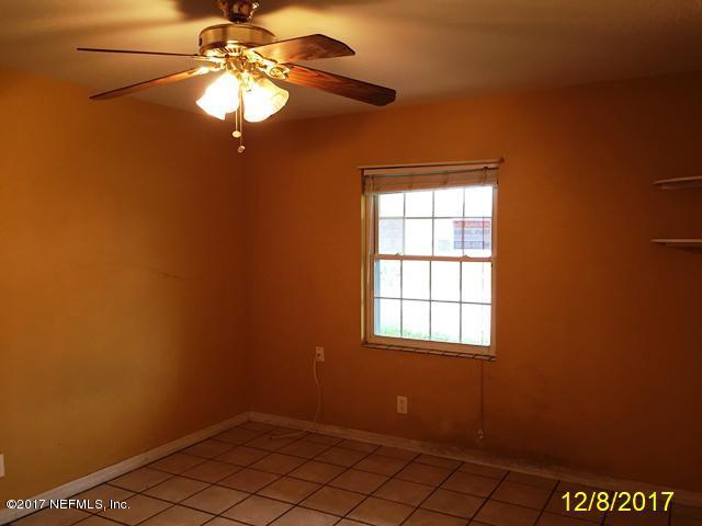 7345 Ridgeway Road North Jacksonville, FL 32244 - Photo 11 of 26 a view of a room that has a window in it