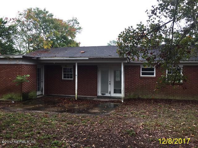 7345 Ridgeway Road North Jacksonville, FL 32244 - Photo 24 of 26 a front view of a house with garden