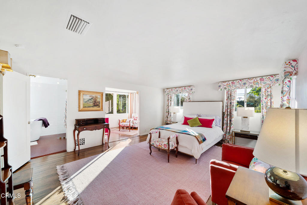 1765 Westhaven Road San Marino, CA 91108 - Photo 36 of 71 a bedroom with furniture and a flat screen tv