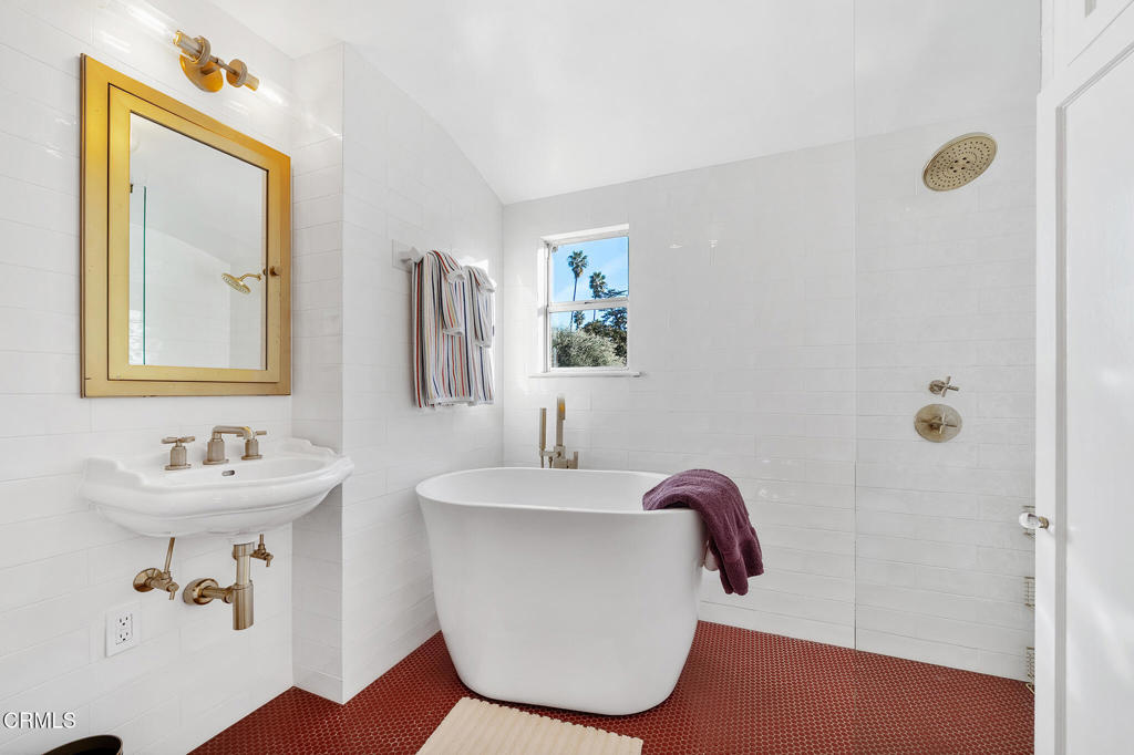 1765 Westhaven Road San Marino, CA 91108 - Photo 40 of 71 a bathroom with a sink vanity and mirror