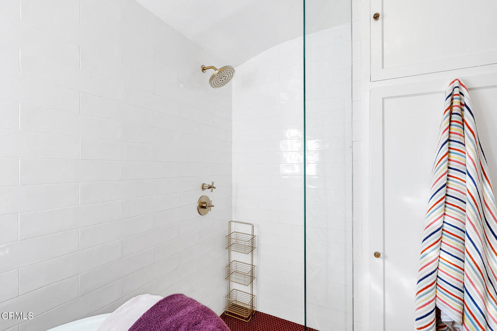 1765 Westhaven Road San Marino, CA 91108 - Photo 41 of 71 a bathroom with a shower and a curtain