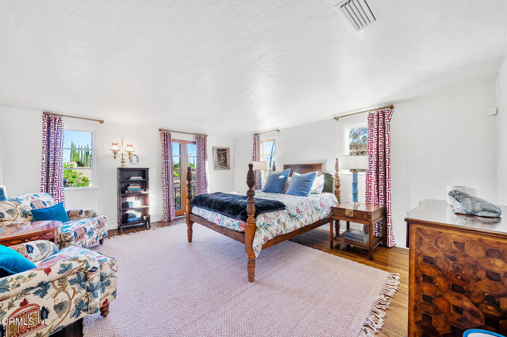 1765 Westhaven Road San Marino, CA 91108 - Photo 42 of 71 a living room with furniture and a couch