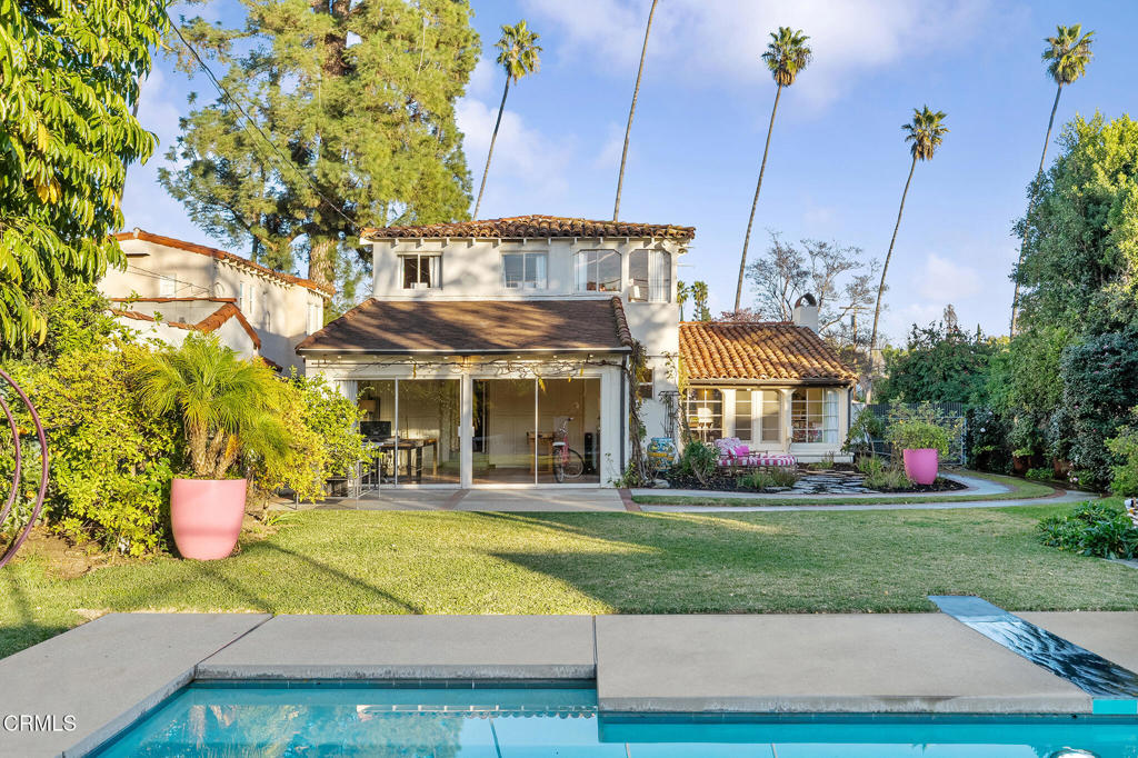 1765 Westhaven Road San Marino, CA 91108 - Photo 55 of 71 a view of a white building with a fountain in front of house