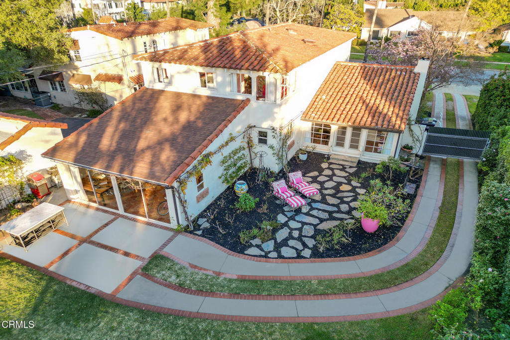 1765 Westhaven Road San Marino, CA 91108 - Photo 63 of 71 a view of a wooden house with a yard and potted plants