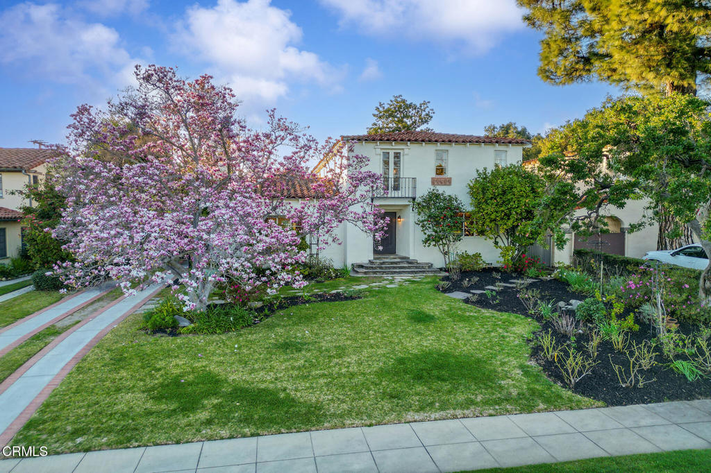 1765 Westhaven Road San Marino, CA 91108 - Photo 67 of 71 a front view of a house with a garden