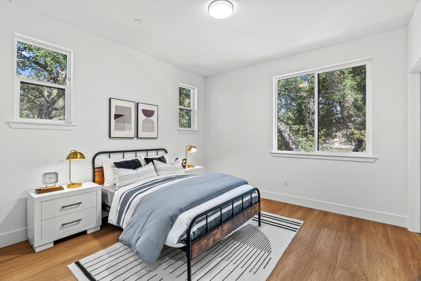 943 Woodside Road Redwood City, CA 94061 - Photo 15 of 19 a bed room with a bed and a window