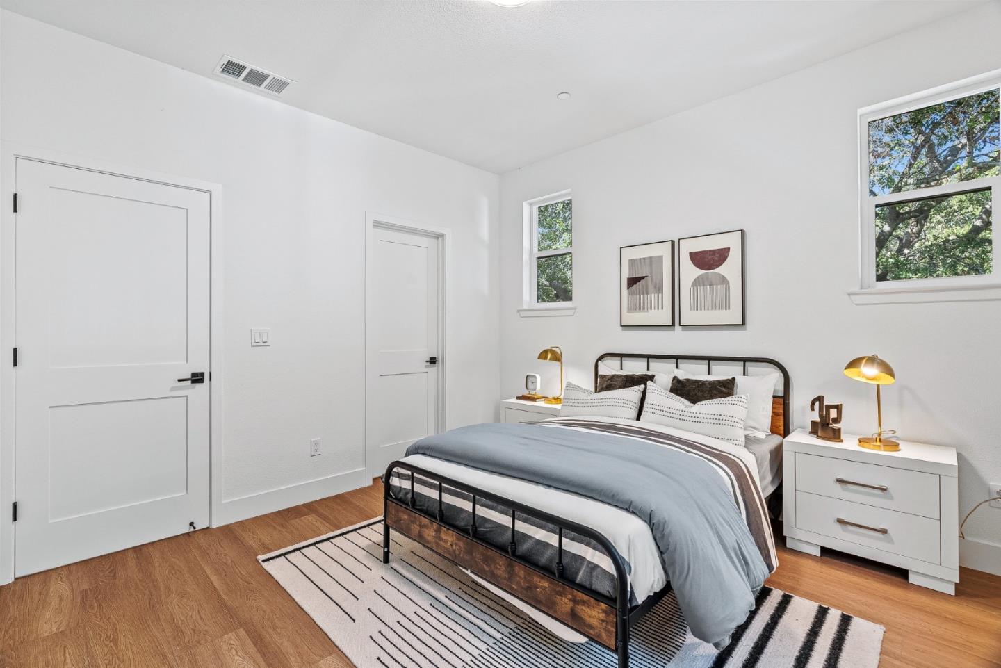 943 Woodside Road Redwood City, CA 94061 - Photo 16 of 19 a bedroom with a bed and a window