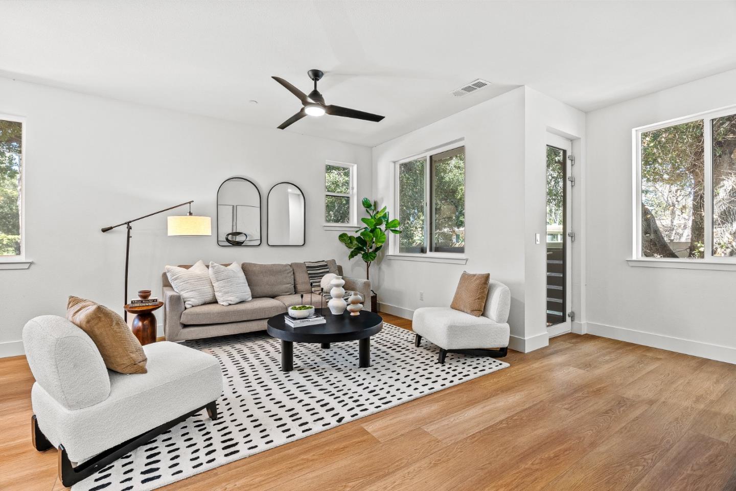 943 Woodside Road Redwood City, CA 94061 - Photo 5 of 19 a living room with furniture