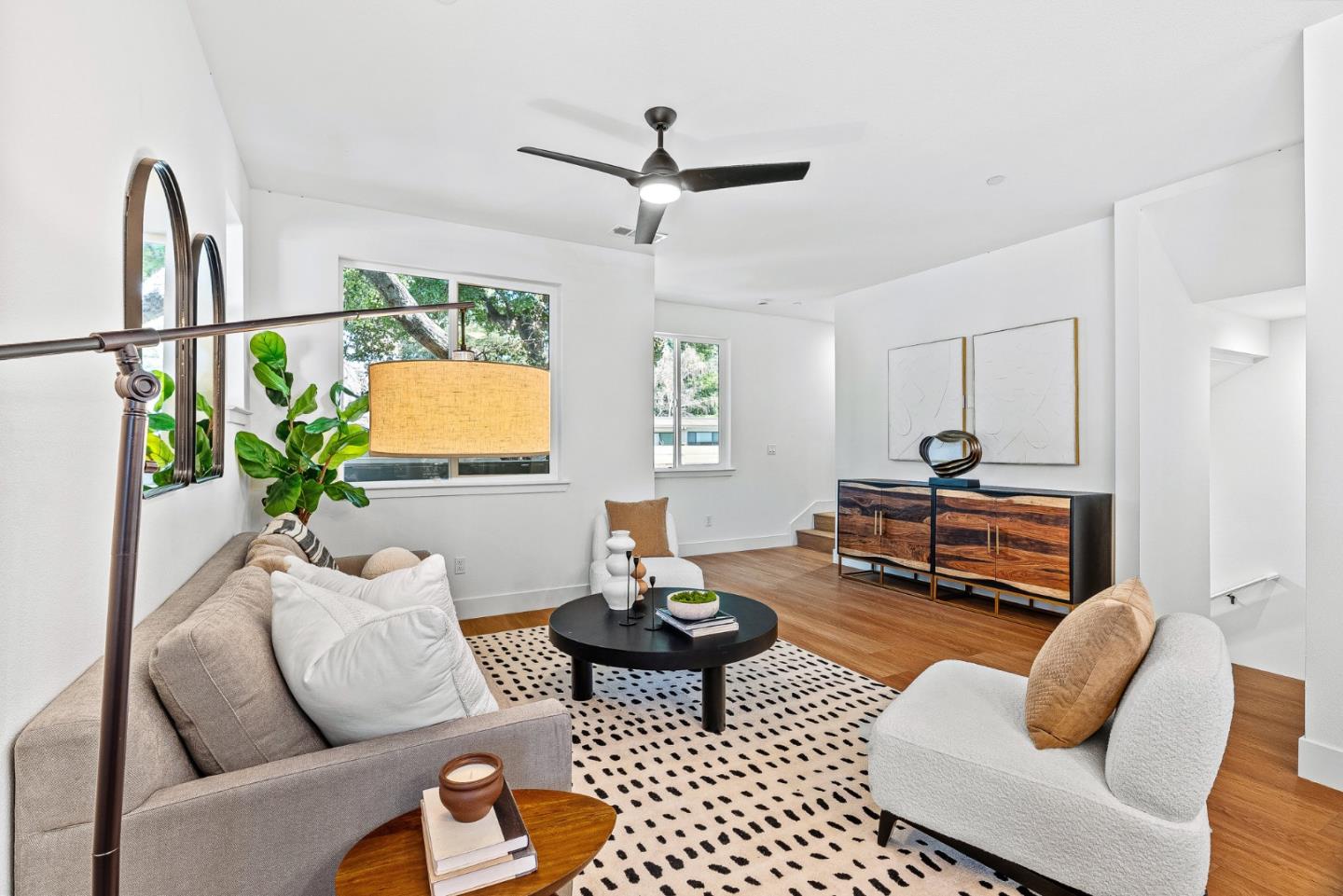 943 Woodside Road Redwood City, CA 94061 - Photo 8 of 19 a living room with furniture and a wooden floor