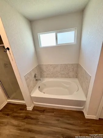 a bathroom with bathtub