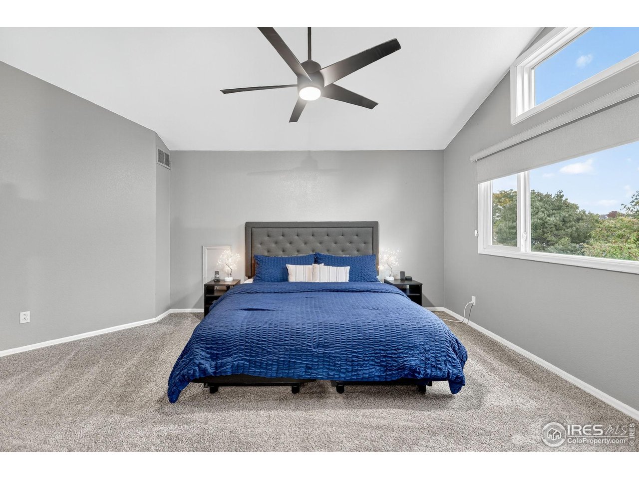 9910 Ashleigh Way Highlands Ranch, CO 80126 - Photo 21 of 45 a bedroom with a bed and window