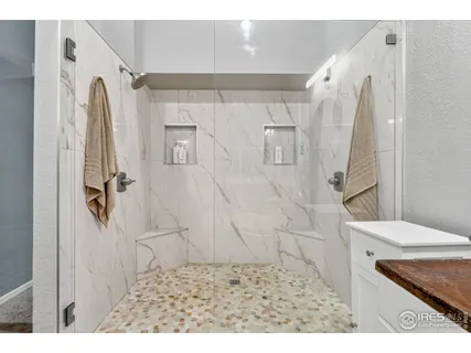 a workspace with a desk chair and painted walls