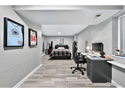 a bathroom with a toilet a sink and shower