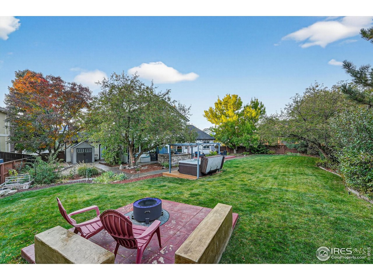 9910 Ashleigh Way Highlands Ranch, CO 80126 - Photo 34 of 45 a view of a backyard with sitting space