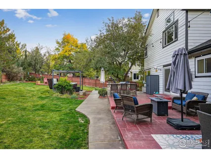 a view of a house with a back yard