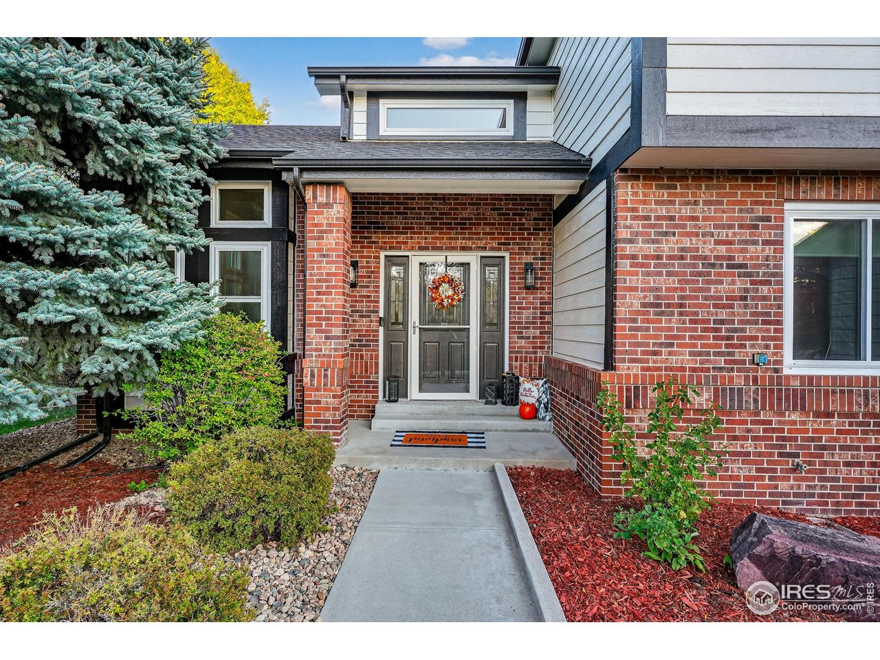 9910 Ashleigh Way Highlands Ranch, CO 80126 - Photo 8 of 45 a view of a pathway with flower pots