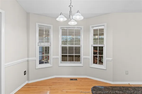 a view of a bedroom with windows