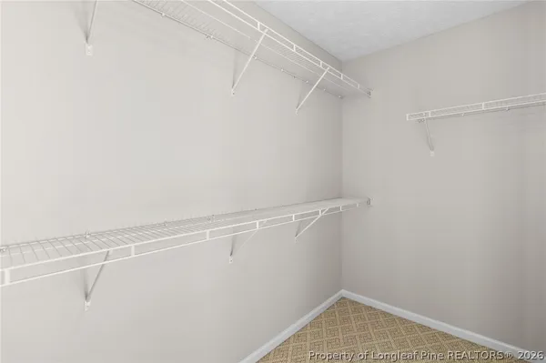 a view of a room with racks on the wall