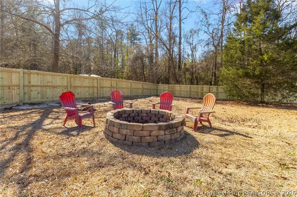 a view of yard with trees