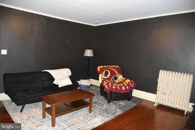 a living room with furniture and a couch