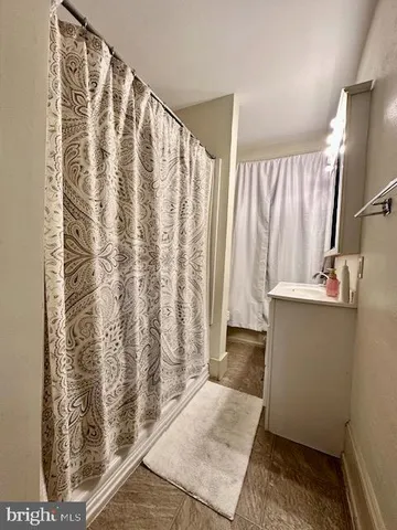 a view of entryway with wooden floor