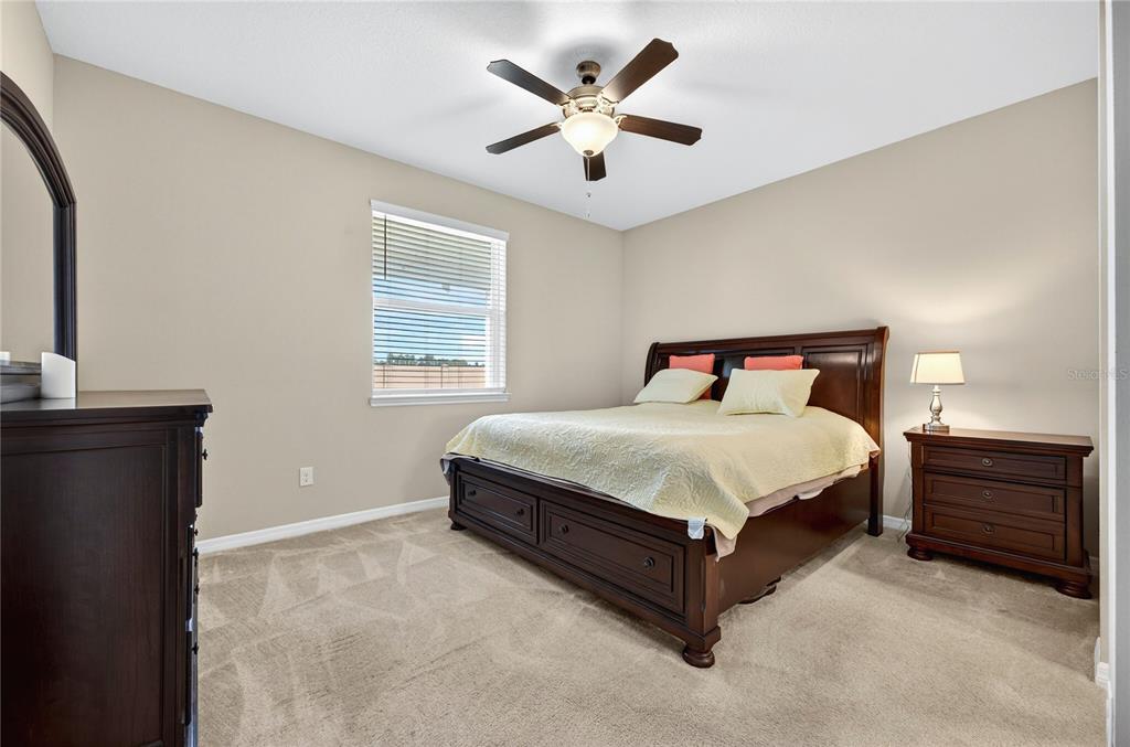 3947 Northwest 46th Ter. Ocala, FL 34482 - Photo 18 of 75 a bedroom with a bed and window