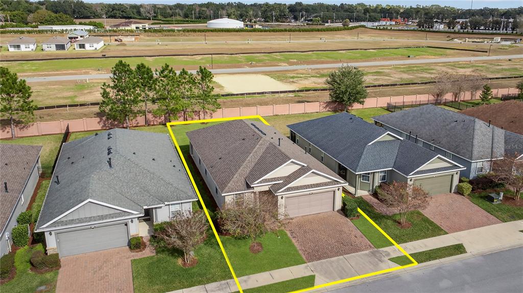3947 Northwest 46th Ter. Ocala, FL 34482 - Photo 2 of 75 a view of a swimming pool with an ocean view