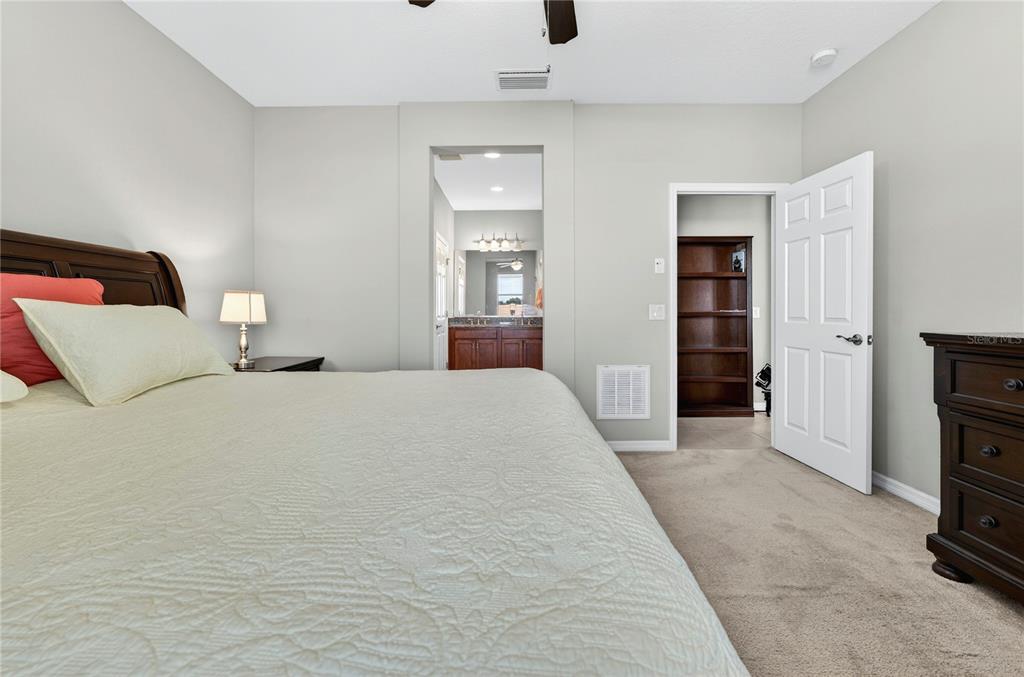 3947 Northwest 46th Ter. Ocala, FL 34482 - Photo 21 of 75 a bedroom with a bed and a television