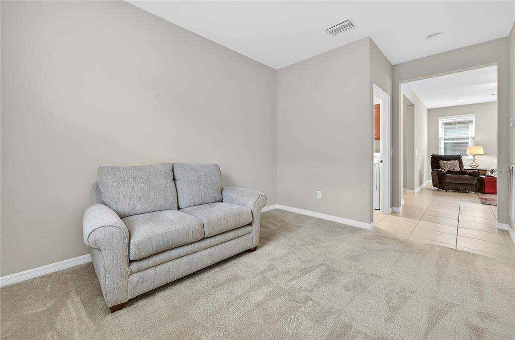 3947 Northwest 46th Ter. Ocala, FL 34482 - Photo 29 of 75 a living room with furniture and a couch