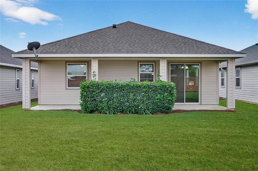 3947 Northwest 46th Ter. Ocala, FL 34482 - Photo 41 of 75 a view of a house with yard and front view of a house